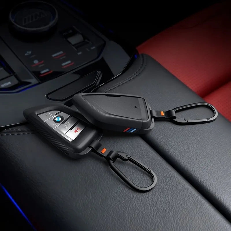 Spigen BK100 – automobilio raktų dėklas „BMW Smart Key G-Series“ (juodas)